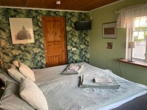 Postel nebo postele na pokoji v ubytování Sanddala Bed & Breakfast