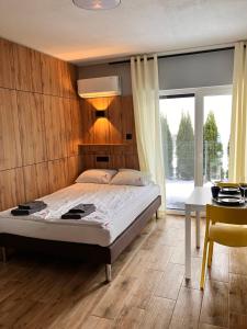 Łóżko lub łóżka w pokoju w obiekcie VILLA LIGHTHOUSE - Adults Only - 12plus