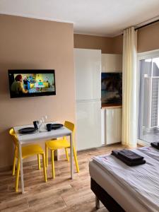 Telewizja i/lub zestaw kina domowego w obiekcie VILLA LIGHTHOUSE - Adults Only - 12plus