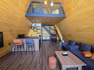 a living room with a couch and a table at Chopan Resort Aparan in Aparan