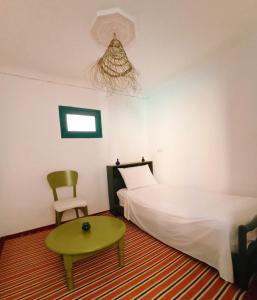 Postel nebo postele na pokoji v ubytování Riad rajad Marrakech