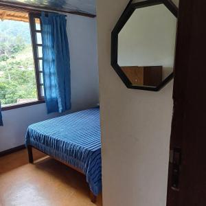 Katil atau katil-katil dalam bilik di Casa do alecrim