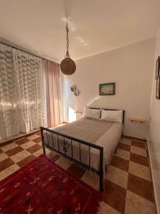 Postel nebo postele na pokoji v ubytování Hotel Al Manar