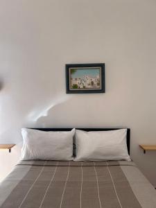 Postel nebo postele na pokoji v ubytování Hotel Al Manar