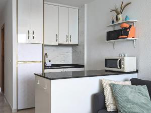 Kuchyň nebo kuchyňský kout v ubytování Los colores del Mar