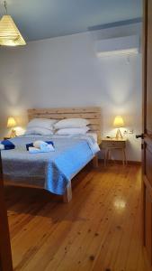 Postel nebo postele na pokoji v ubytování Villa Leonidas just enjoy your holidays