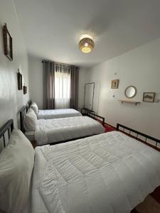Postel nebo postele na pokoji v ubytování Hotel Al Manar