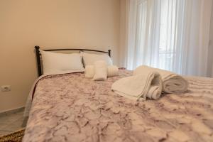 Ένα ή περισσότερα κρεβάτια σε δωμάτιο στο Vicky's view house