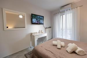 Ένα ή περισσότερα κρεβάτια σε δωμάτιο στο Vicky's view house