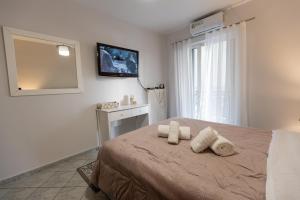 Ένα ή περισσότερα κρεβάτια σε δωμάτιο στο Vicky's view house
