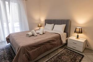 Ένα ή περισσότερα κρεβάτια σε δωμάτιο στο Vicky's view house