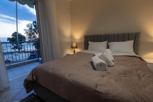 Ένα ή περισσότερα κρεβάτια σε δωμάτιο στο Vicky's view house