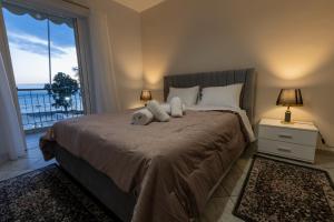 Ένα ή περισσότερα κρεβάτια σε δωμάτιο στο Vicky's view house