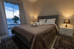 Ένα ή περισσότερα κρεβάτια σε δωμάτιο στο Vicky's view house