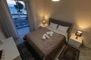 Ένα ή περισσότερα κρεβάτια σε δωμάτιο στο Vicky's view house