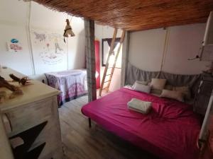 Postel nebo postele na pokoji v ubytování Il Rustico Bunker