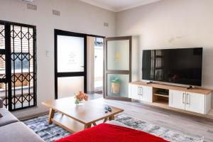 TV a/nebo společenská místnost v ubytování Beck Apartments