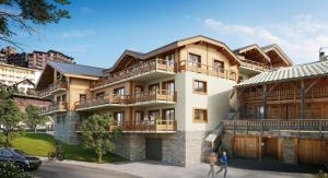 a building with people walking in front of it at Incroyable T2 neuf et spacieux - Garage privé in L'Alpe-d'Huez