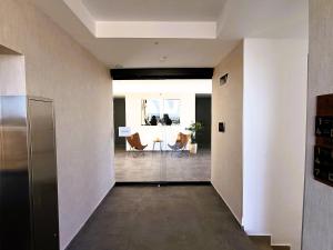 Setusvæði á Basento Deluxe Apartment with parking pool gym padel
