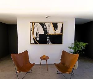 Setusvæði á Basento Deluxe Apartment with parking pool gym padel