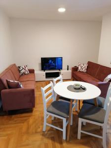 TV/trung tâm giải trí tại Sneža +2 ảnh