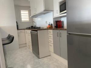 Kuchyňa alebo kuchynka v ubytovaní Apartamento Jaume II Palamós