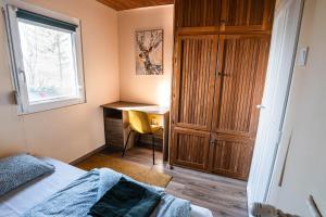 A bed or beds in a room at Molnárkalács vendégház
