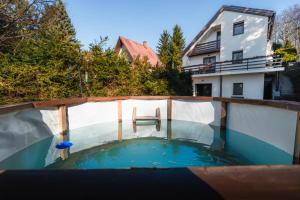 The swimming pool at or close to Molnárkalács vendégház
