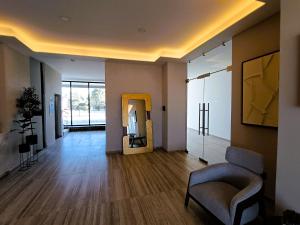 Setusvæði á Basento Deluxe Apartment with parking pool gym padel