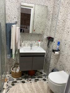Un baño de Апартамент от Ольги 9 fotos más