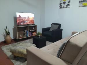 Posezení v ubytování OBhouse Apartment, para sentirse como en casa!