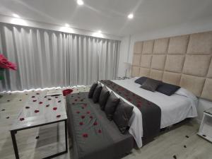 Postel nebo postele na pokoji v ubytování Mirador samsara Suite Luxury piso completo
