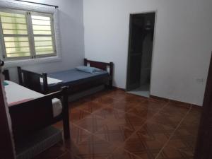 Postel nebo postele na pokoji v ubytování casa playa eden coveñas