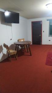 TV a/nebo společenská místnost v ubytování Hotel Rincón Paraíso