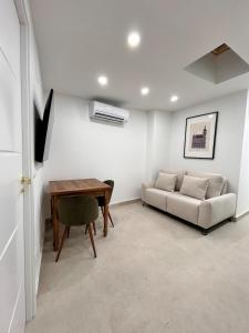 Et opholdsområde på AeroSuites103 Alojamiento Madrid