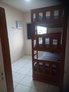 a room with two bunk beds in a room at Pousada Victor - Arte in Manaus