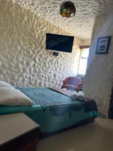 Postel nebo postele na pokoji v ubytování Ancla Hostal