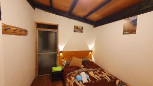 Postel nebo postele na pokoji v ubytování Starlight Mountain Lodge