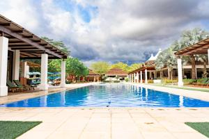 Bazén v ubytování Malinche 110-B, 1 Bedroom Condo At Reserva Conchal nebo v jeho okolí