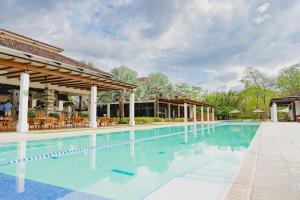 Bazén v ubytování Malinche 110-B, 1 Bedroom Condo At Reserva Conchal nebo v jeho okolí