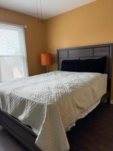 Postel nebo postele na pokoji v ubytování Room in Lawrenceville