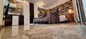 Η κουζίνα ή μικρή κουζίνα στο Malee home stay