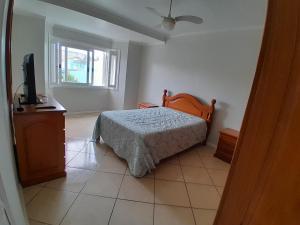 Ένα ή περισσότερα κρεβάτια σε δωμάτιο στο Casa residencial Gemine