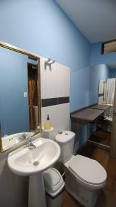 Koupelna v ubytování Hotel Simón Plaza