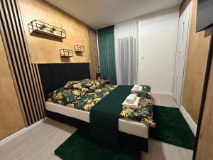 Postel nebo postele na pokoji v ubytování Bobrowa Przystań