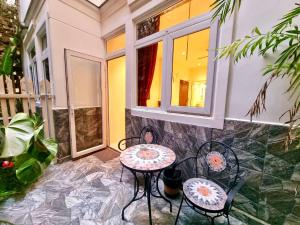 Predel za sedenje v nastanitvi Tulip Hotel 3