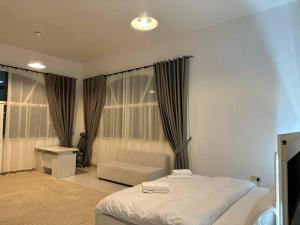 Postel nebo postele na pokoji v ubytování Oasis Villa Stay by Lunar