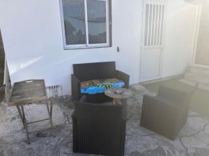 Posezení v ubytování Logement indépendant St leu dans les bas