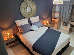 Krevet ili kreveti u jedinici u okviru objekta Villa Lé fé péi 3 étoiles +4 fotografije