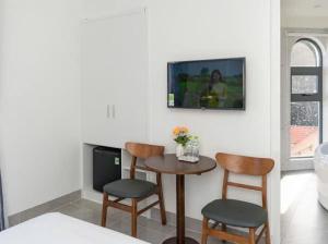 TV a/nebo společenská místnost v ubytování Sun Hill Hotel